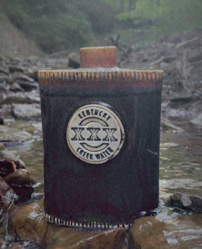 Kentucky Mountain Moonshine flask with cork